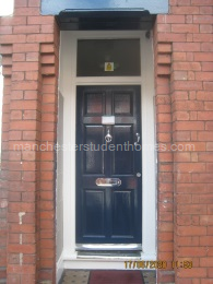 Security light and mock CCTV camera at the entrance