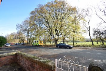View over Platt Lane to Platt Fields Park