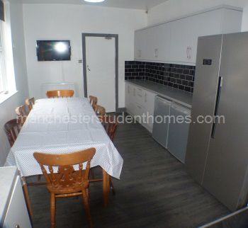 Dining area has a 32" flat screen TV