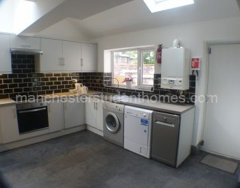 Photograph showing the washing machine, tumble dryer and dishwasher.  The house has full central heating too!