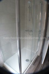 No 1 bathroom has a large shower cubicle and electric shower