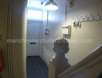 Spacious hall way.  Front/back doors are reinforced for extra security. The house is fully alarmed