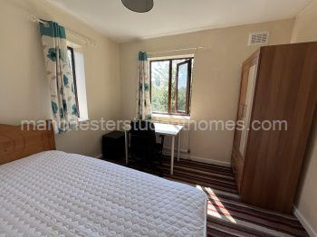 Upstairs back bedroom on the left Pic 2