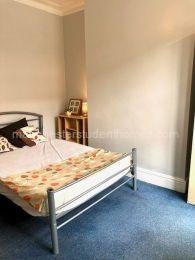 Bedroom 3 that now has wooden flooring